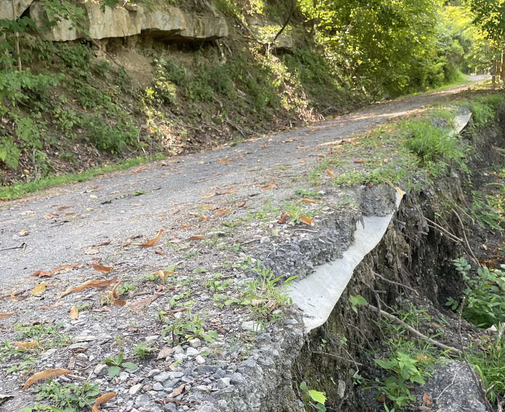 Cheat Lake Park & Trail shows active collapse of the walking trail as Eagle Creek Renewable Energy is alleged to neglect drainage ditches